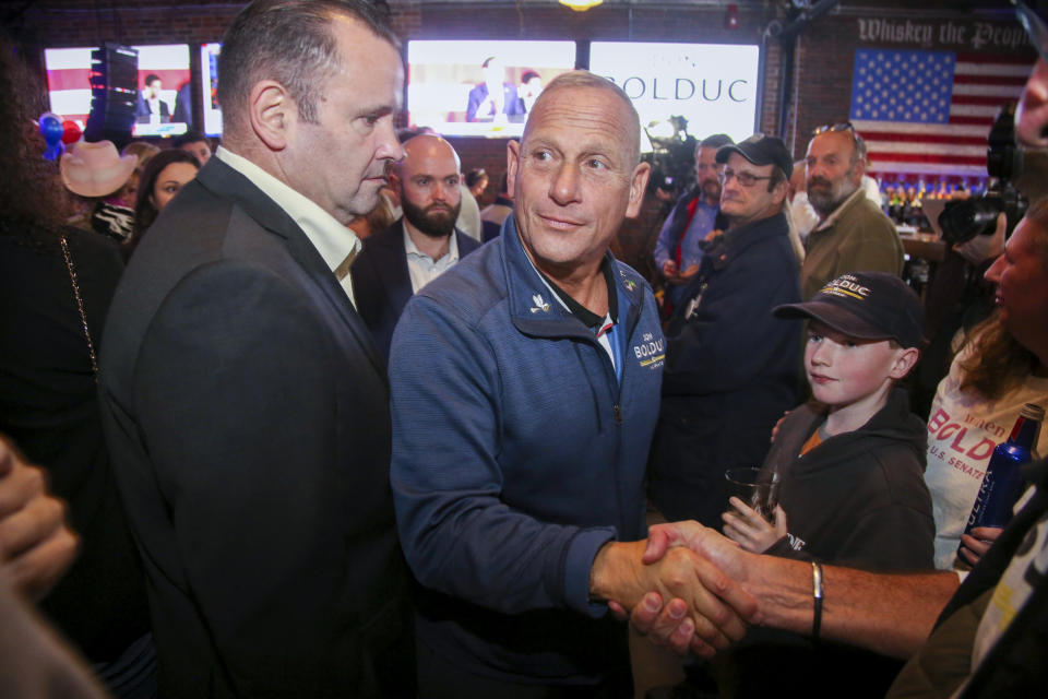 New Hampshire Republican Senate candidate Don Bolduc, greets the crowd during an election night campaign gathering, Tuesday Nov. 8, 2022, in Manchester, N.H. (AP Photo/Reba Saldanha)