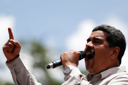 Venezuela's President Nicolas Maduro delivers a speech to supporters during a campaign rally in Charallave, Venezuela May 15, 2018. REUTERS/Carlos Garcia Rawlins