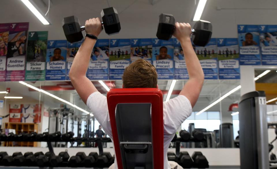 Evan Dilley, 16, of Jackson lifts at Schalmo Family YMCA in Canal Fulton.