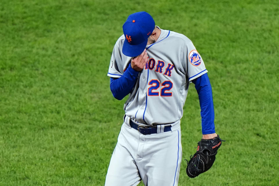 New York Mets pitcher Rick Porcello wipes his face during the fourth inning of a baseball game against the Philadelphia Phillies, Tuesday, Sept. 15, 2020, in Philadelphia. (AP Photo/Matt Slocum)