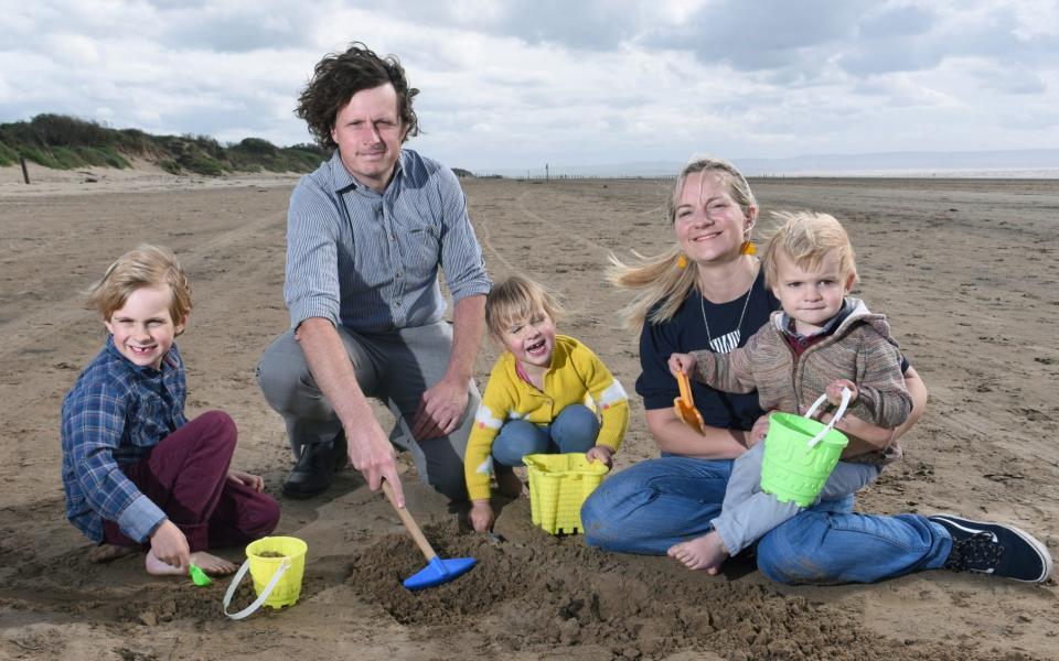 Your Money Pix show Rachel Smith, her partner Stuart Smith, son Owen (aged 6), daughter Ruby (4) and son Zac (2) near their holiday flat at Brean, Somerset - JAY WILLIAMS