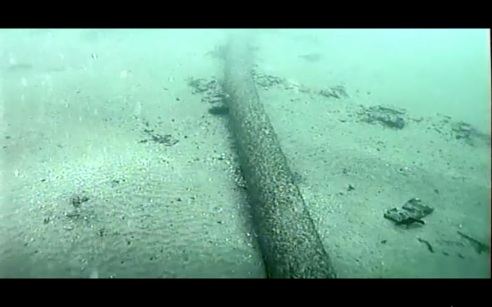 FILE - This still image from video taken Oct. 4, 2021, and provided by the U.S. Coast Guard shows an underwater pipeline that spilled tens of thousands of gallons of oil off the coast of Orange County, Calif. An offshore pipeline involved in a 2021 oil spill that fouled Southern California beaches is being put back in service, the operator said. Amplify Energy Corp. said Monday, April 10, 2023, that it received approval from federal regulatory agencies to restart operations and last weekend began the process of filling the pipeline, which is expected to take about two weeks. (U.S. Coast Guard via AP, File)