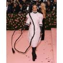 Tessa Thompson's super long BDSM-inspired braid was one of our <a href="https://www.allure.com/story/black-celebrity-beauty-red-carpet-glam-teams?mbid=synd_yahoo_rss" rel="nofollow noopener" target="_blank" data-ylk="slk:favorite hair looks;elm:context_link;itc:0;sec:content-canvas" class="link ">favorite hair looks</a> from the 2019 Met Gala, "Notes on Camp." The style comes courtesy of <a href="https://www.instagram.com/lacyredway/" rel="nofollow noopener" target="_blank" data-ylk="slk:Lacy Redway;elm:context_link;itc:0;sec:content-canvas" class="link ">Lacy Redway</a>, who left a little tassel at the end of the <a href="https://www.vogue.com/article/tessa-thompson-met-gala-2019-red-carpet-beauty-12-foot-braid?mbid=synd_yahoo_rss" rel="nofollow noopener" target="_blank" data-ylk="slk:12-foot long;elm:context_link;itc:0;sec:content-canvas" class="link ">12-foot long</a> latex braid so it could resemble a whip.