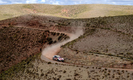 Dakar Rally - 2017 Paraguay-Bolivia-Argentina Dakar rally - 39th Dakar Edition - Eighth stage from Uyuni, Bolivia to Salta, Argentina 10/01/17. Peugeot's driver Stephane Peterhansel and his co-driver Jean Paul Cottret of France in action. REUTERS/Franck Fife/Pool