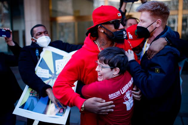 Amazon Labor Union President Christian Smalls (in red hoodie) hugs fellow organizers after the final unionization votes were counted on April 1. Smalls has endorsed Brittany Ramos-DeBarros for Congress. (Photo: Eduardo Munoz Alvarez/Associated Press)