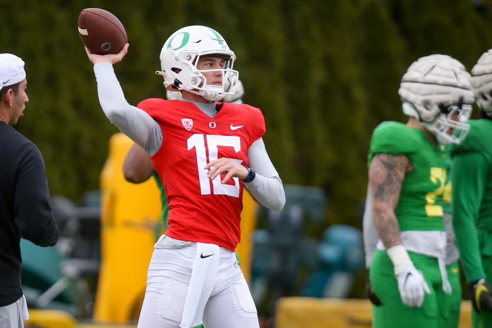 Oregon quarterback Austin Novosad throws out a pass during a practice with the Ducks April 6, 2023, in Eugene.