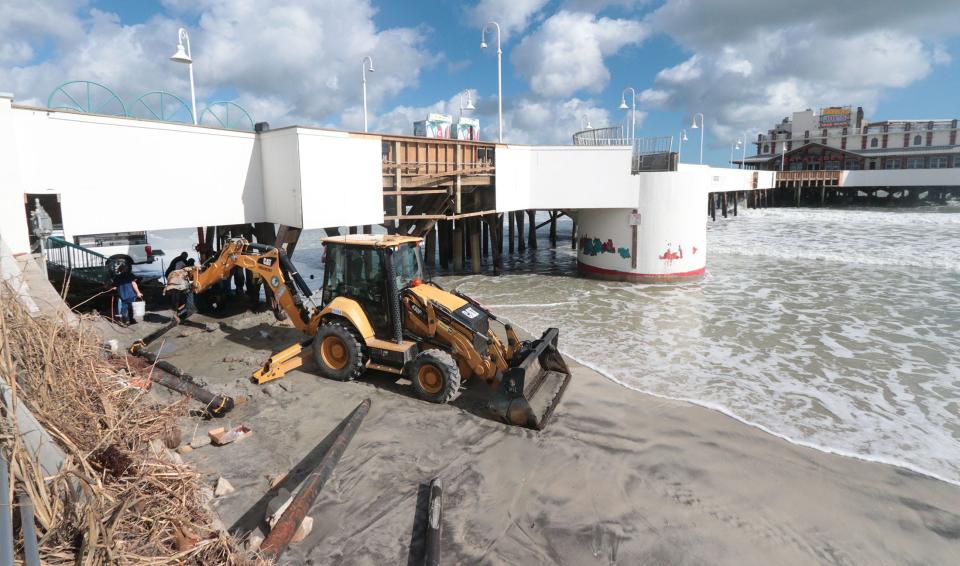 Daytona Beach Public Works Department employees made repairs to a water line to the Daytona Beach Pier on Nov. 12, 2022 after Tropical Storm Nicole blasted Volusia County.