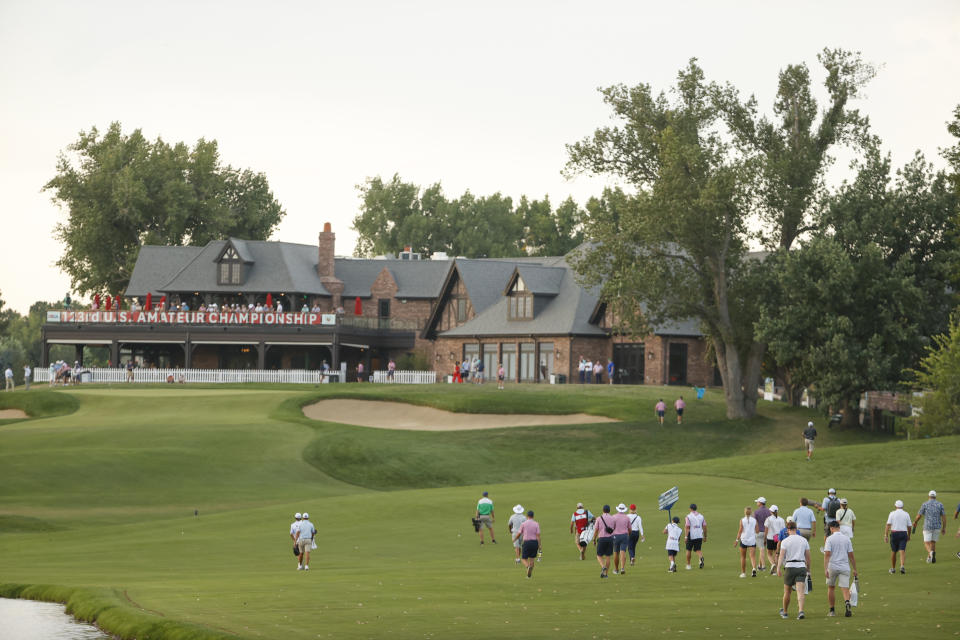 Connor Gaunt and his caddie walk up the hole 18 fairway during the round of 16 of the 2023 U.S. Amateur at Cherry Hills C.C. in Cherry Hills Village, Colo. on Thursday, Aug. 17, 2023. (Chris Keane/USGA)