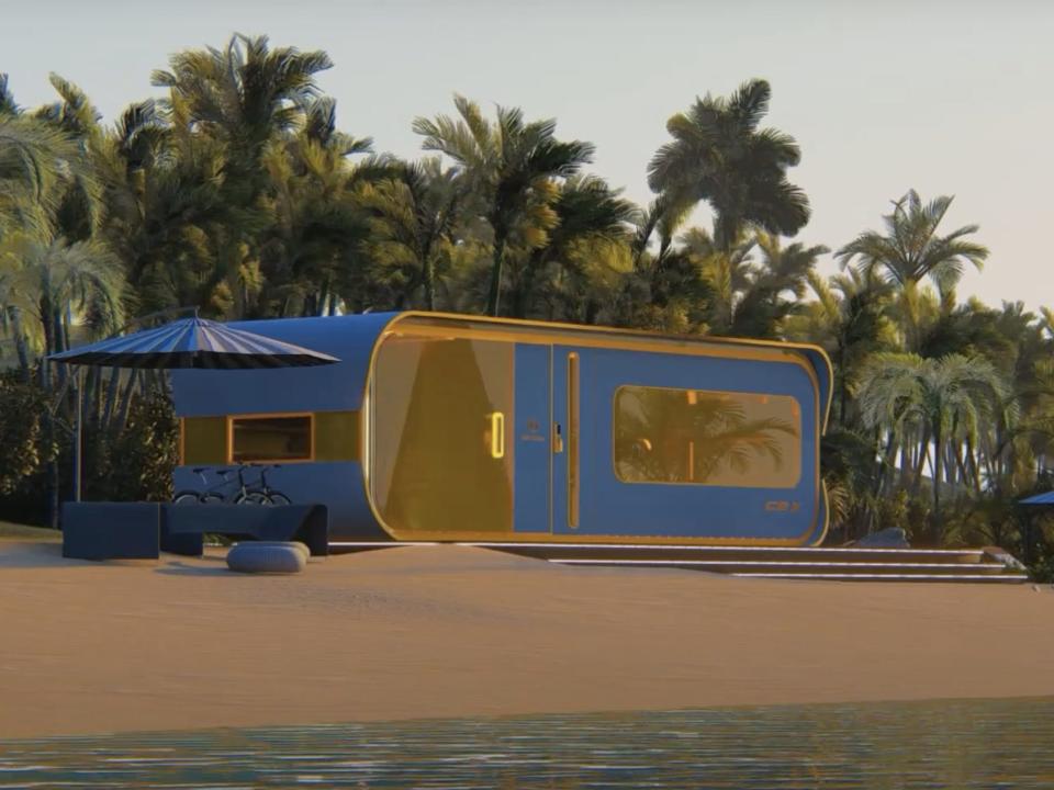 a rendering of the Cube Two X tiny home on a beach