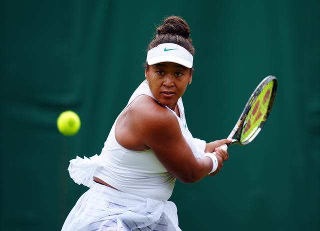 Naomi Osaka keeps her eye on the ball as she prepares to play a backhand