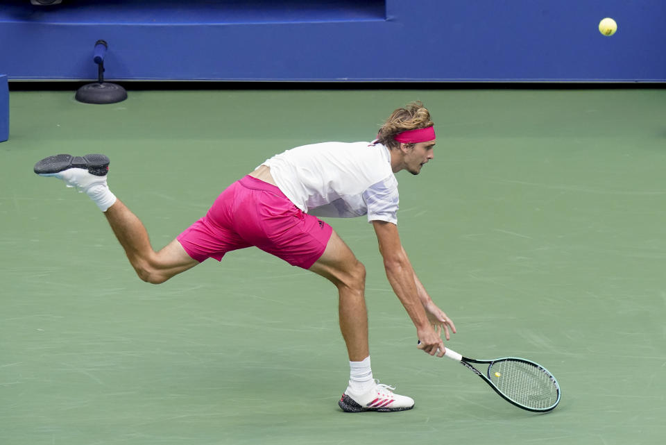 Alexander Zverev, of Germany, returns a shot to Pablo Carreno Busta, of Spain, during a men's semifinal match of the US Open tennis championships, Friday, Sept. 11, 2020, in New York. (AP Photo/Frank Franklin II)