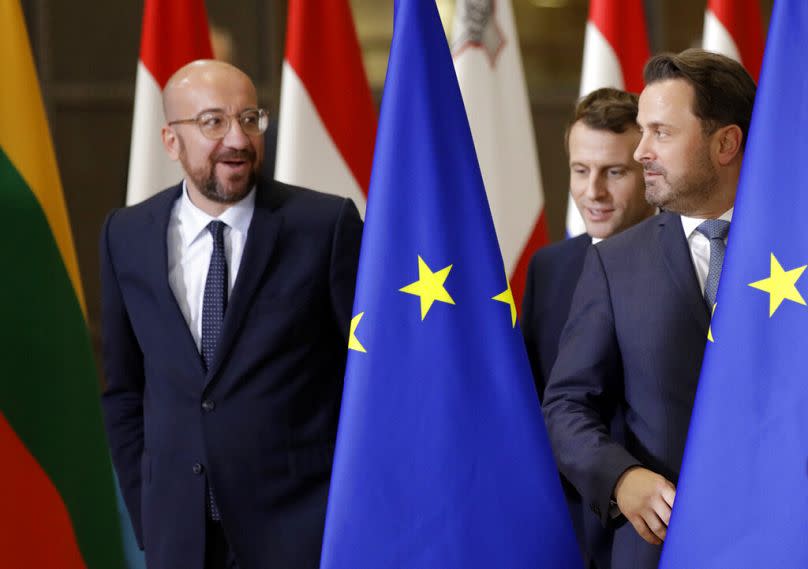 European Council President Charles Michel, French President Emmanuel Macron and Luxembourg Deputy PM Xavier Bettel at the European Council building in Brussels, December 2019