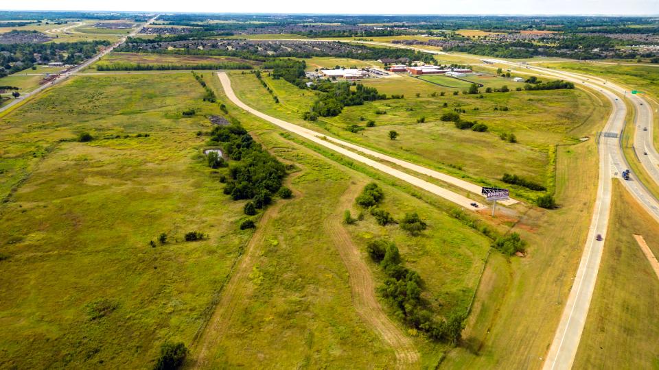 A drone shot of the land where JW Roth, chairman and CEO of Notes Live Inc. plans to build the new Sunset Amphitheater at Mustang Creek in Oklahoma City. Sept. 13, 2023