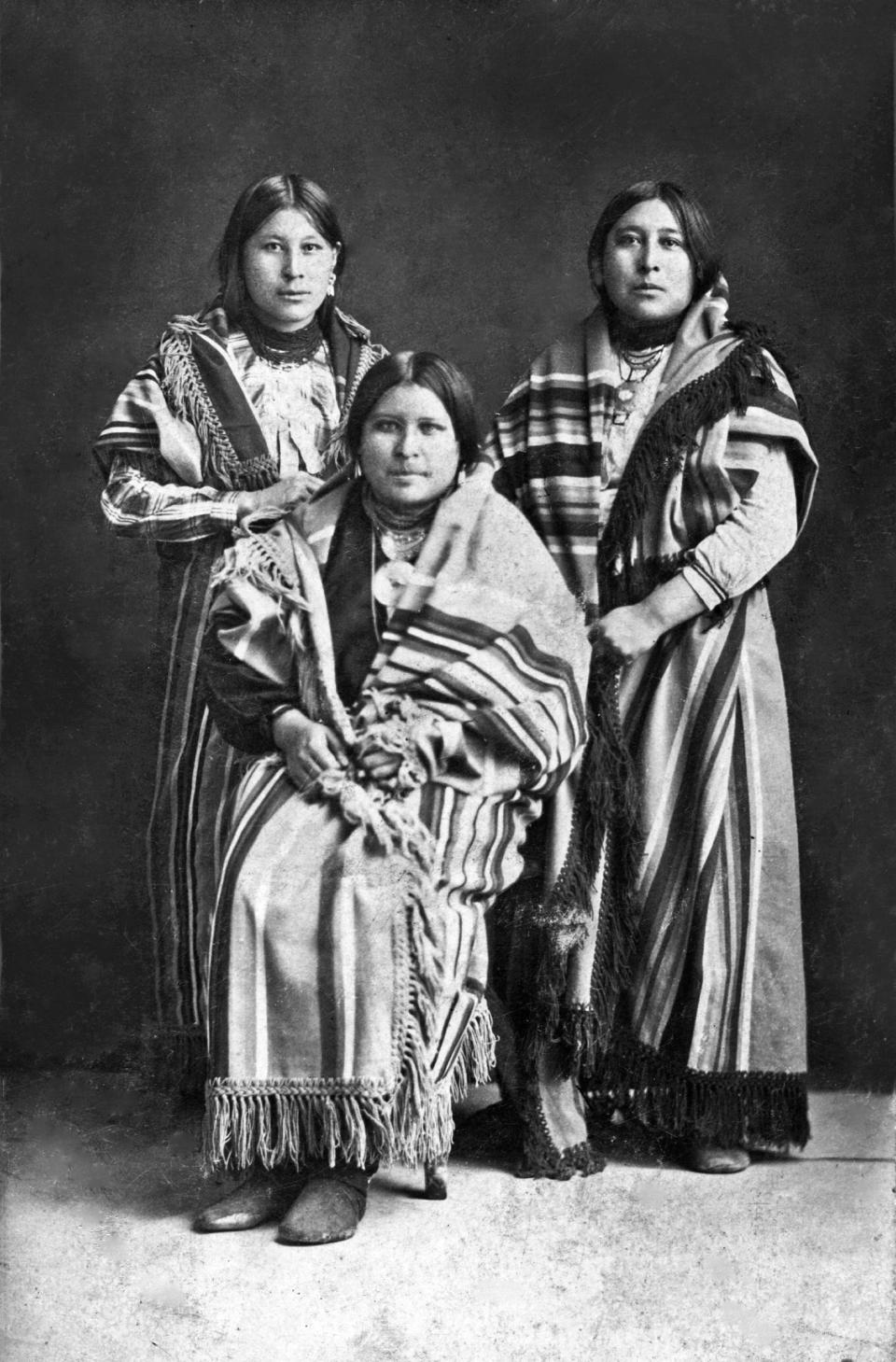 From right, Mollie Burkhart is pictured with her sisters Anna and Minnie in a photo from "Killers of the Flower Moon: Adapted for Young Readers," by David Grann.