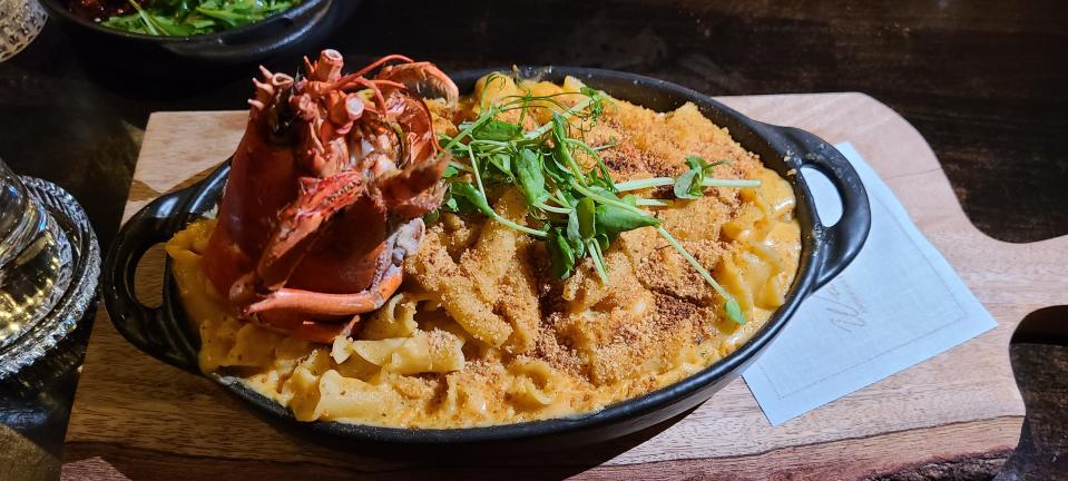 Warren Naples's "Damn Good Lobster Mac N Cheese" topped with a lobster head, $30.