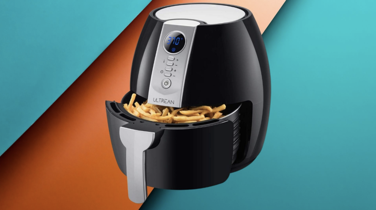 Air Fryer shown open with french fries inside