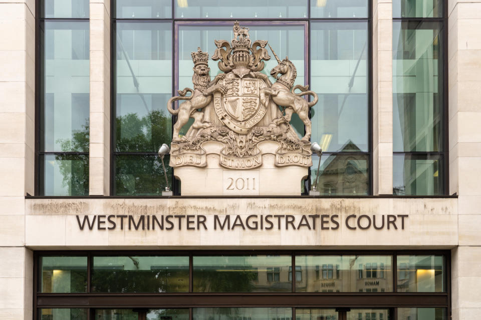 London, England - August 12, 2021: The royal coat of arms above the entrance to Westminster Magistrates’ Court in London, England.