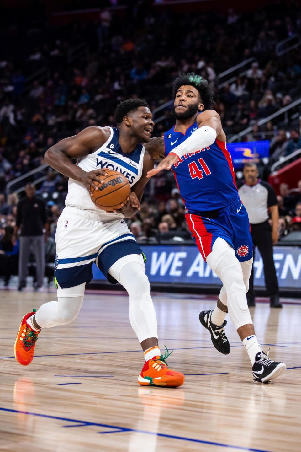 Minnesota Timberwolves guard Anthony Edwards drives to the basket against Detroit Pistons forward Saddiq Bey in the first quarter at Little Caesars Arena, Jan. 11, 2023.