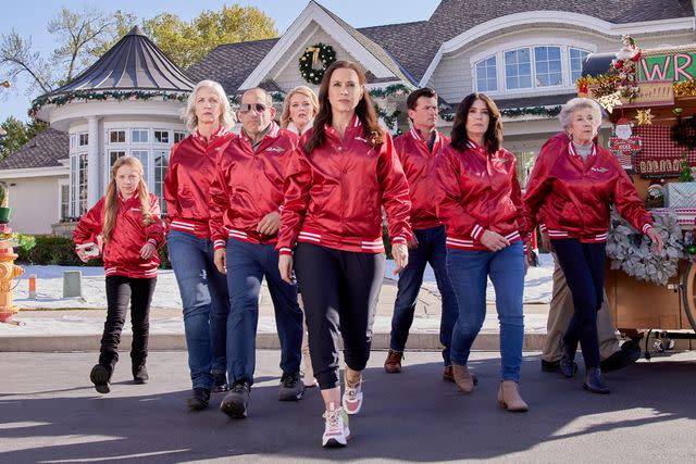 <p>Courtesy of Hallmark</p> Lacey Chabert and Wes Brown reunite for 'Haul Out the Holly: Lit Up'