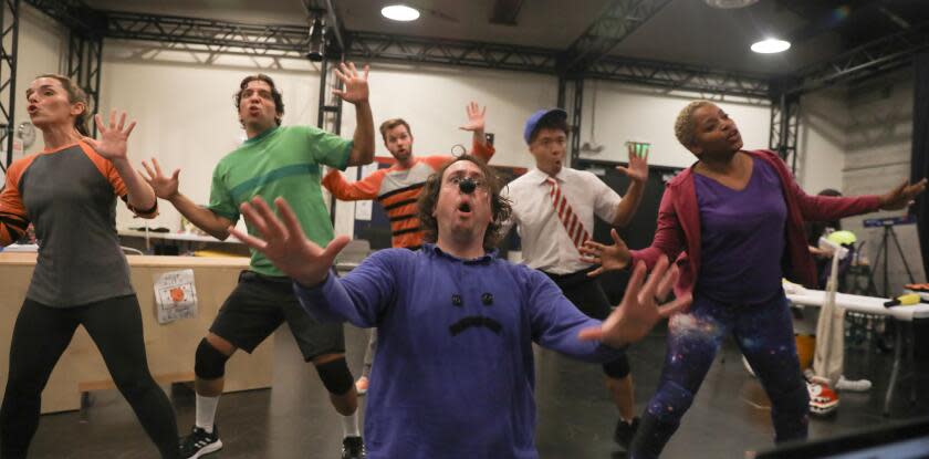 Los Angeles, CA - November 15: The full assemble cast of Dog Man: The Musical perform during a rehearsal at Kirk Douglas Theater on Wednesday, Nov. 15, 2023 in Los Angeles, CA. (Michael Blackshire / Los Angeles Times)