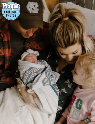 <p>Karis Marie Photography</p> Cort Bogan and Cassidy Montalvo with daughters Piper and Lucy