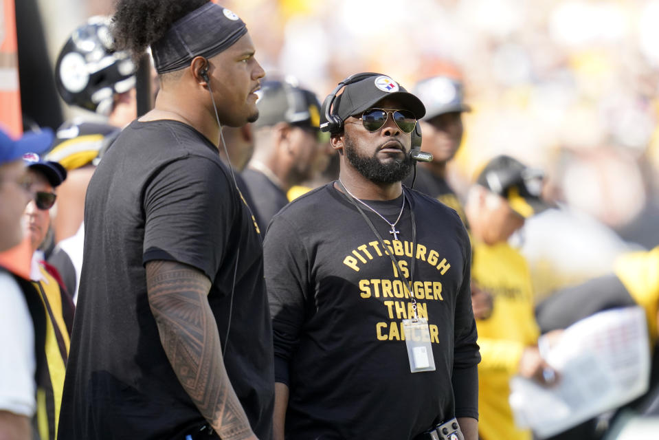 Pittsburgh Steelers head coach Mike Tomlin, right, and Zach Banner stand on the sideline during the second half of an NFL football game against the Denver Broncos in Pittsburgh, Sunday, Oct. 10, 2021. (AP Photo/Keith Srakocic)