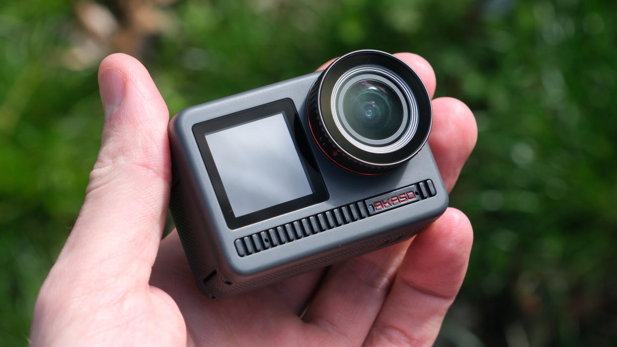  Akaso Brave 8 action camera held in a hand. 