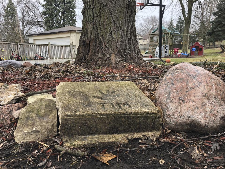 A slab of concrete sits in the backyard of the house where Timmothy Pitzen used to live in Aurora. Source: AP