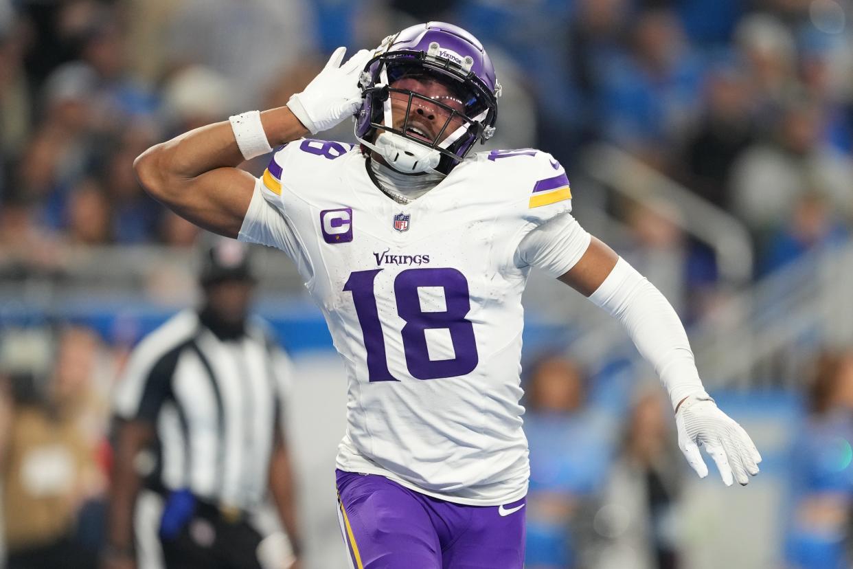 Justin Jefferson #18 of the Minnesota Vikings celebrates after a touchdown during the third quarter in the game against the Detroit Lions at Ford Field on January 07, 2024 in Detroit, Michigan.