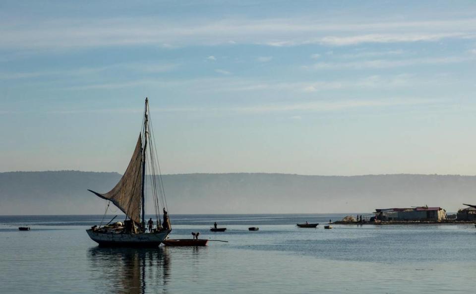 A Haitian sailboat with hand-sewn sails prepares to leave after being loaded with merchandise in Port-de-Paix, Haiti along the northwest coast on March 26, 2022.