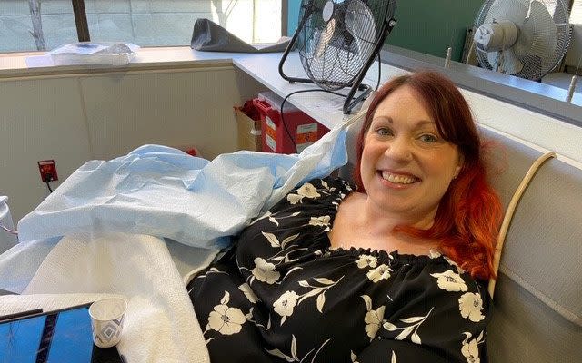 Elizabeth Schneider, 37, donating blood plasma in Seattle
