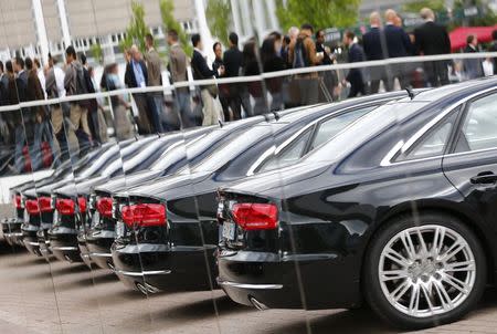 File photo of Audi cars reflected in mirrors during a media preview day at the Frankfurt Motor Show (IAA) September 10, 2013. REUTERS/Pawel Kopczynski/Files