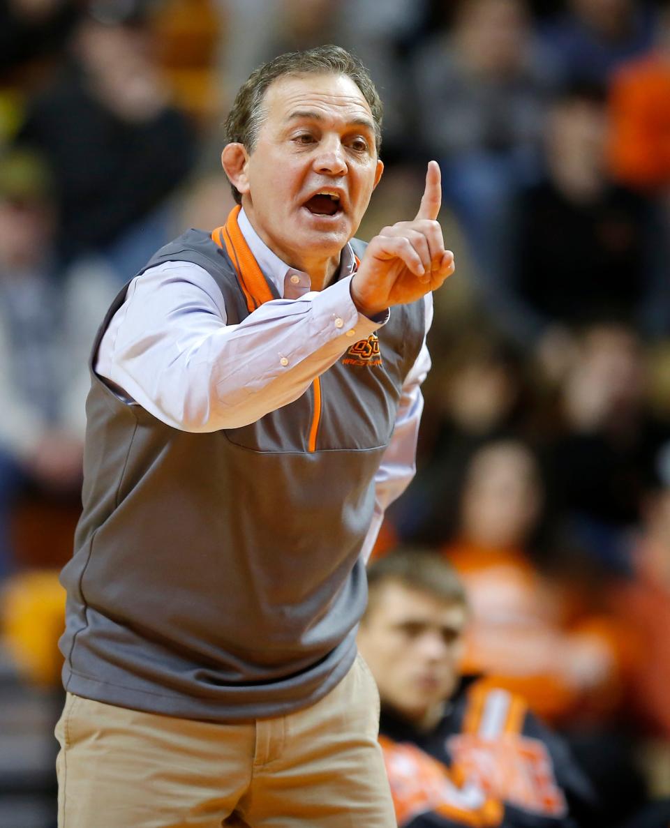 OSU wrestling coach John Smith announced his retirement Thursday after 33 seasons, 490 dual victories and five NCAA titles.