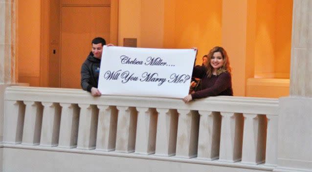 Friends of the couple held a sign that read,