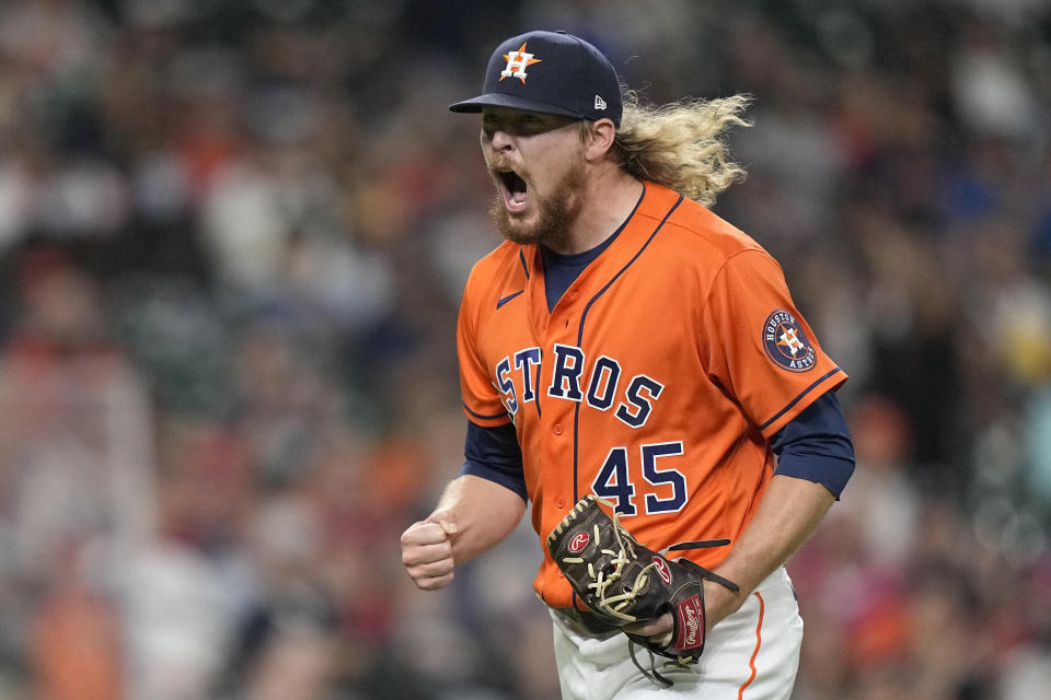 Houston Astros relief pitcher Ryne Stanek yells after striking out Los Angeles Angels' Albert Pujols during the eighth inning of a baseball game Friday, April 23, 2021, in Houston. (AP Photo/David J. Phillip)