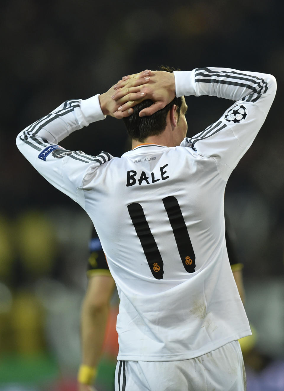 Real's Gareth Bale reacts during the Champions League quarterfinal second leg soccer match between Borussia Dortmund and Real Madrid in the Signal Iduna stadium in Dortmund, Germany, Tuesday, April 8, 2014. (AP Photo/Martin Meissner)