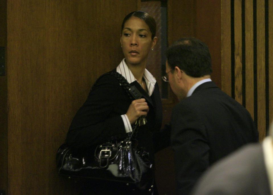 Christine Beatty leaves court for the day with her lawyer Jeffrey Morganroth after appearing in the courtroom of Judge Timothy Kenny in the Frank Murphy Hall of Justice in Detroit on Oct. 15, 2008.