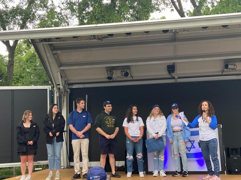 Jewish student leaders on campus at universities across Michigan are honored while on stage at the Detroit Zoo on May 28, 2024, for an event celebrating Israel's 76th independence day. The students sang Israel's national anthem, Hatikvah, with the crowd singing along.