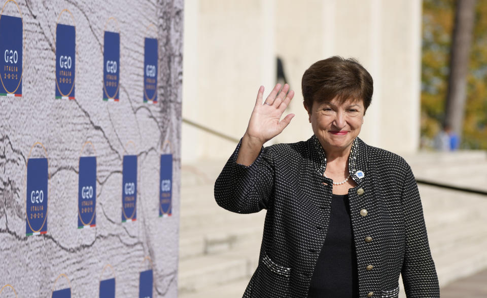 International Monetary Fund President Kristalina Georgieva waves as she arrives for a meeting of G20 finance and health ministers at the Salone delle Fontane (Hall of Fountains) in Rome, Friday, Oct. 29, 2021. A Group of 20 summit scheduled for this weekend in Rome is the first in-person gathering of leaders of the world's biggest economies since the COVID-19 pandemic started. (AP Photo/Alessandra Tarantino)