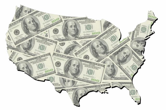 map of united states with random one hundred dollars bills