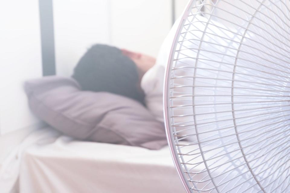 We can get used to regular or predictable sounds, such as a whirring fan. <a href="https://www.shutterstock.com/image-photo/man-sleeping-on-bed-turn-fan-1469214524" rel="nofollow noopener" target="_blank" data-ylk="slk:Shutterstock" class="link ">Shutterstock</a>