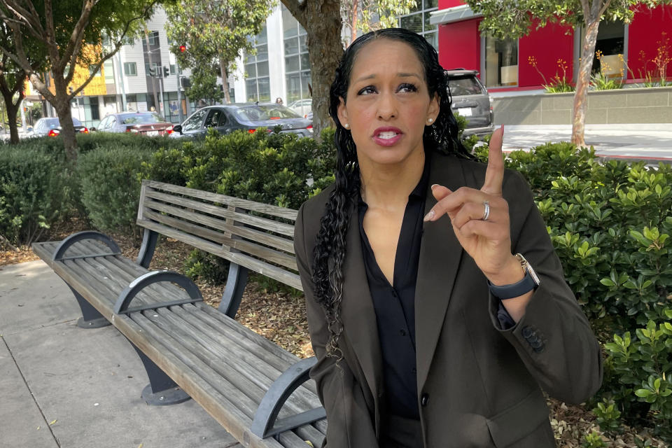 Brooke Jenkins standing near a bench talks about the upcoming recall election of San Francisco District Attorney Chesa Boudin.