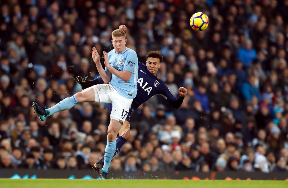 Tottenham’s Dele Alli (right) and Manchester City’s Kevin De Bruyne battle for the ball