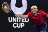 United States' Taylor Fritz plays a forehand return to Poland's Hubert Hurkacz during their semifinal match at the United Cup tennis event in Sydney, Australia, Saturday, Jan. 7, 2023. (AP Photo/Mark Baker)