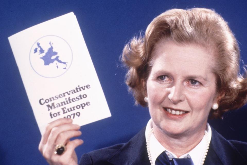 Thatcher holding a copy of the Conservative Manifesto for Europe 1979 at that year’s Conservative Party Conference (REX)