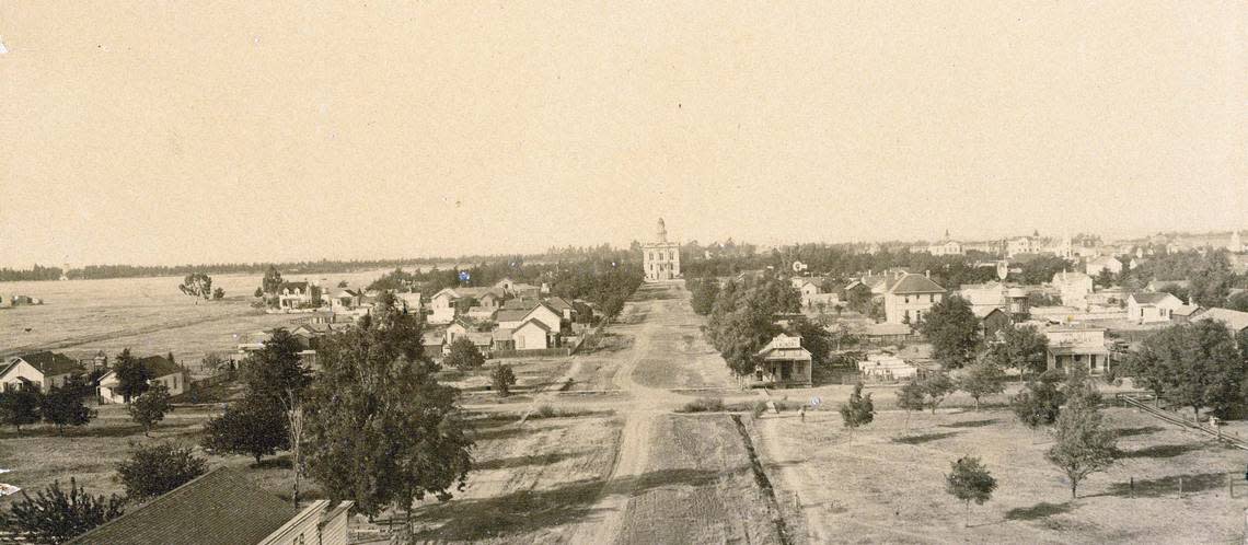 Looking down from El Capitan Hotel on N Street, Courthouse Park is seen in the background. Notice how little development it is on the land west of Courthouse Park in this 1889 photo. 