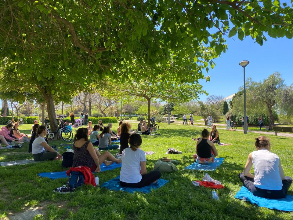 Yoga in Turia Gardens, Valencia, Spain