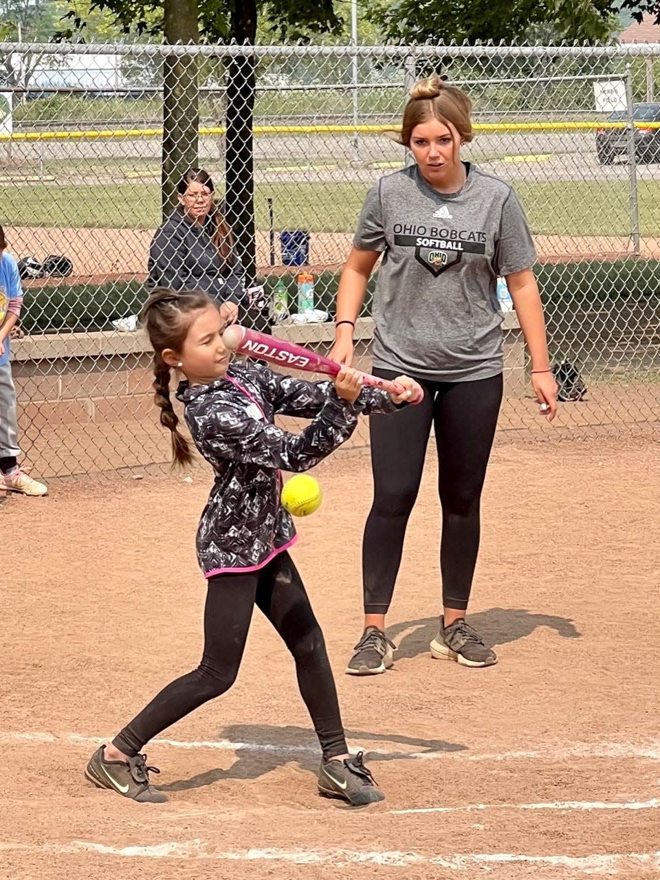 Ohio University softball third baseman Shelby Westler, a River Valley grad, helps out at last year's Greg Swepston youth clinch.