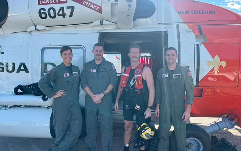 The US Coast Guard crew that rescued James Michael Grimes, 28, after he fell off a cruise ship the night before Thanksgiving. From left Lt Katy Caraway, AMT2 Dalton Goetsch, Aviation Survival Technician 2nd Class Richard ‘Dicky’ Hoefle, and Lt Travis Rhea. (USCG District 8)