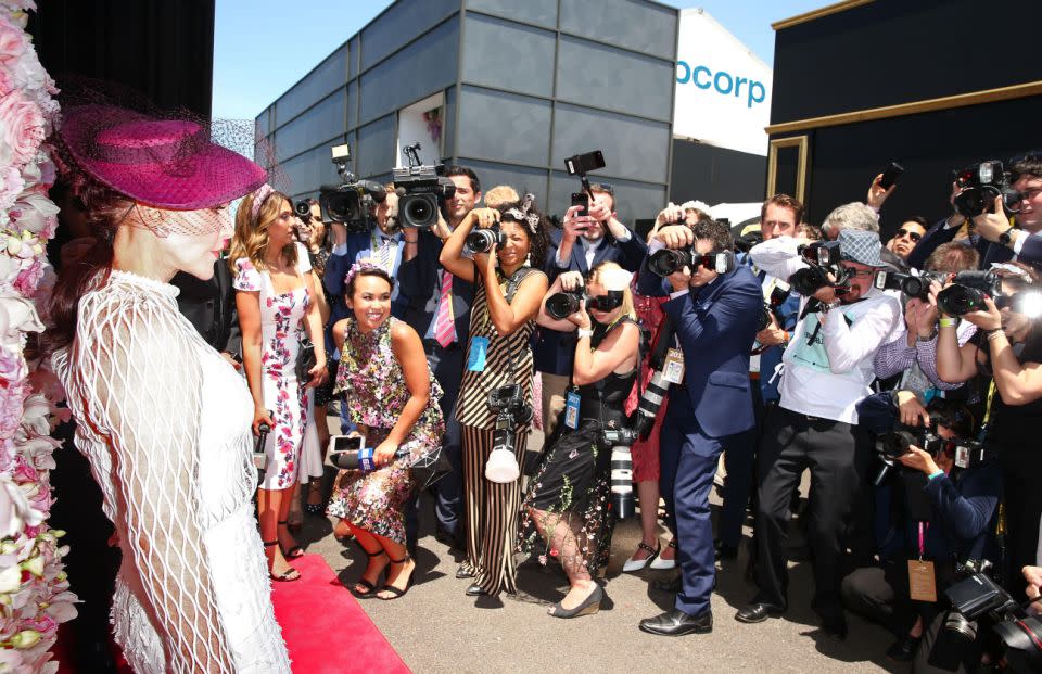 The 72-year-old was swamped by waiting photographers. Photo: Getty Images